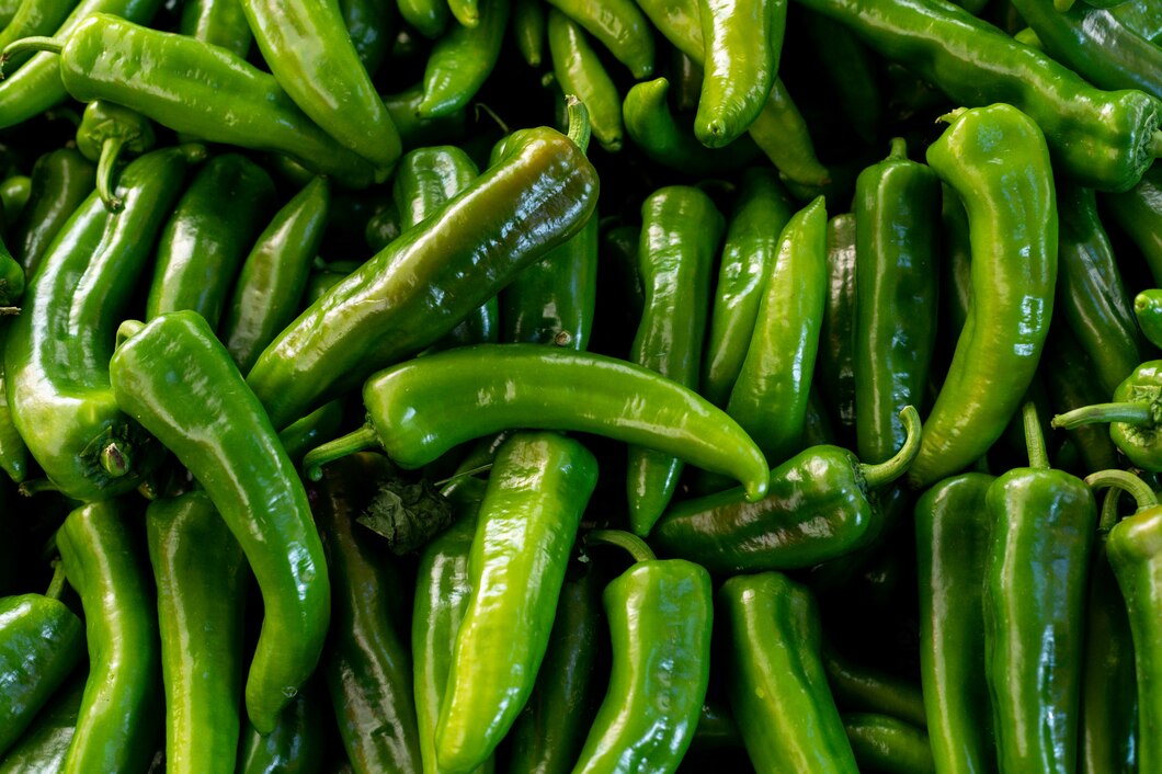 top-view-green-peppers-surface_176474-771